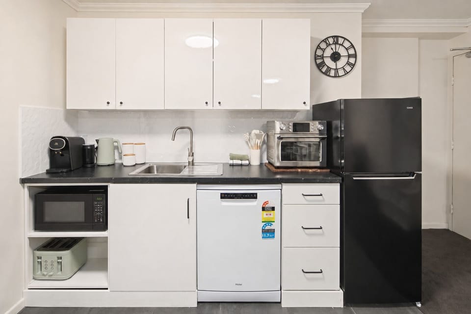 Enjoy a cup of fresh morning coffee before heading out. The kitchenette offers a microwave, espresso machine, and a toaster.
