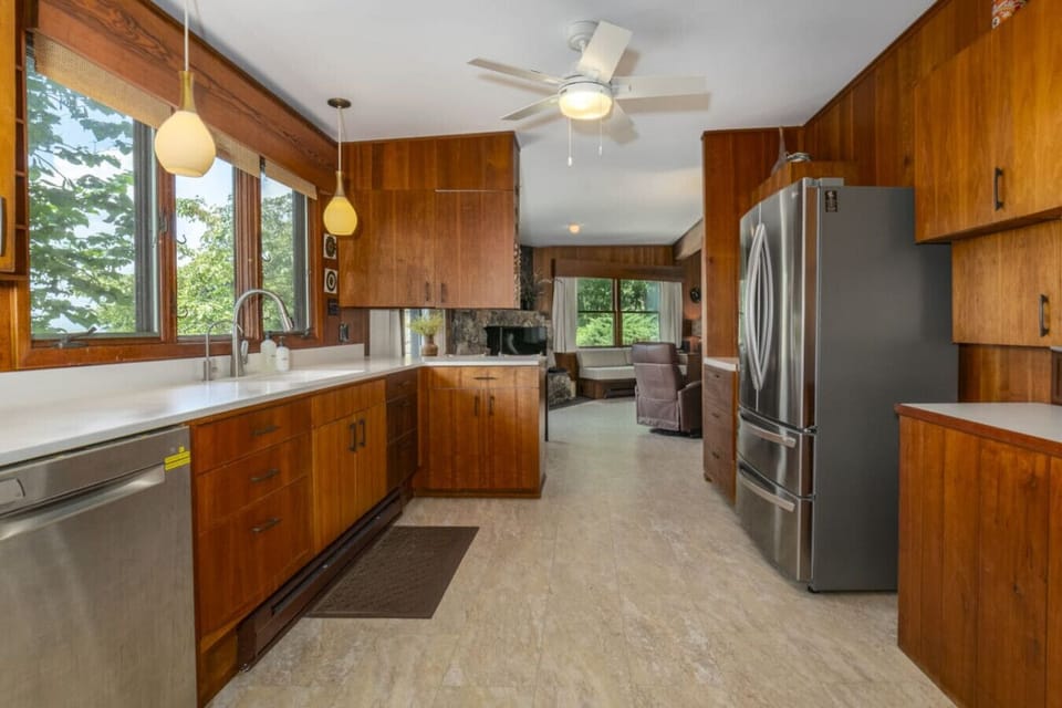 Vintage vibes, modern convenience! This mid-century kitchen blends original design with everything you need for a hassle-free stay.