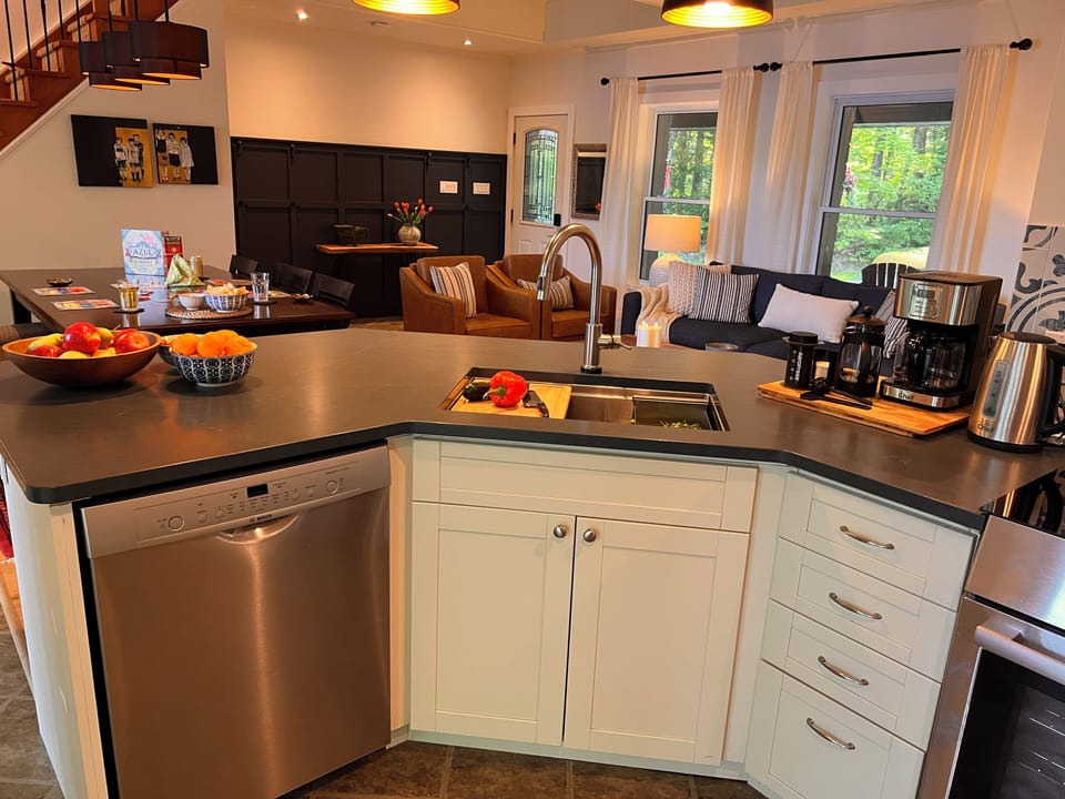 Lots of prep space, dishwasher. Very social kitchen - open to the living room