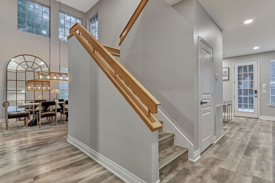 Staircase towards Three Cozy Bedrooms Upstairs