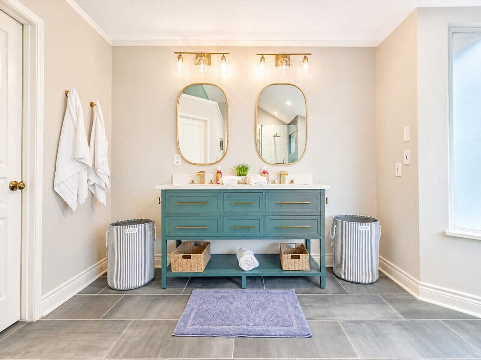 Luxurious Bathroom with Double Vanity and Designer Fixtures