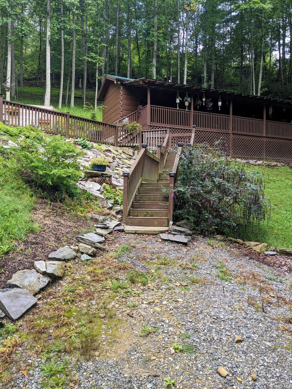 Parking area; stairs up to cabin have solar lights