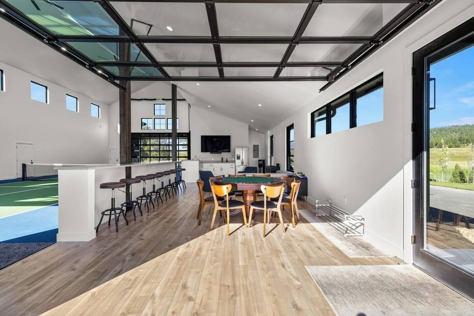 Party Room with Poker Table and Bar Stools