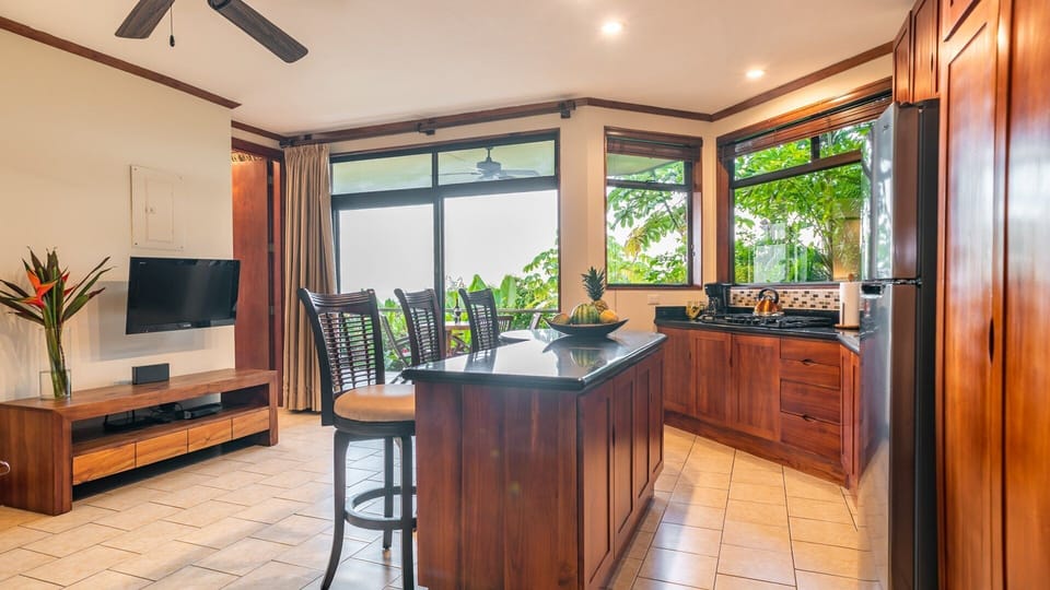 Kitchen, island, and television