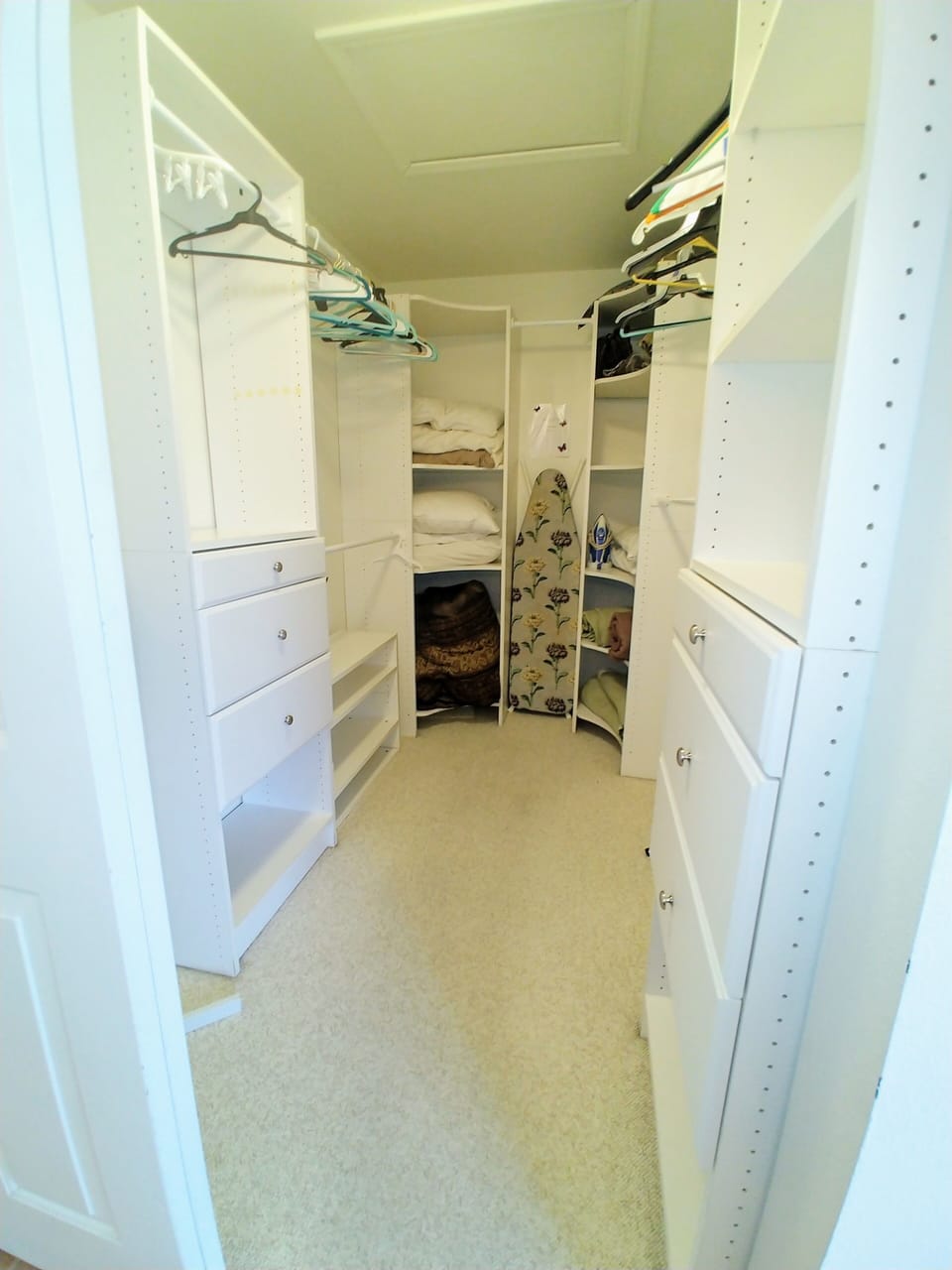 Primary bedroom closet has plenty of space for your clothes and belongings. 