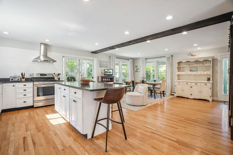 Fully equipped kitchen with dishwasher! This space is perfect for family gatherings. High chair is located in the kitchen. 