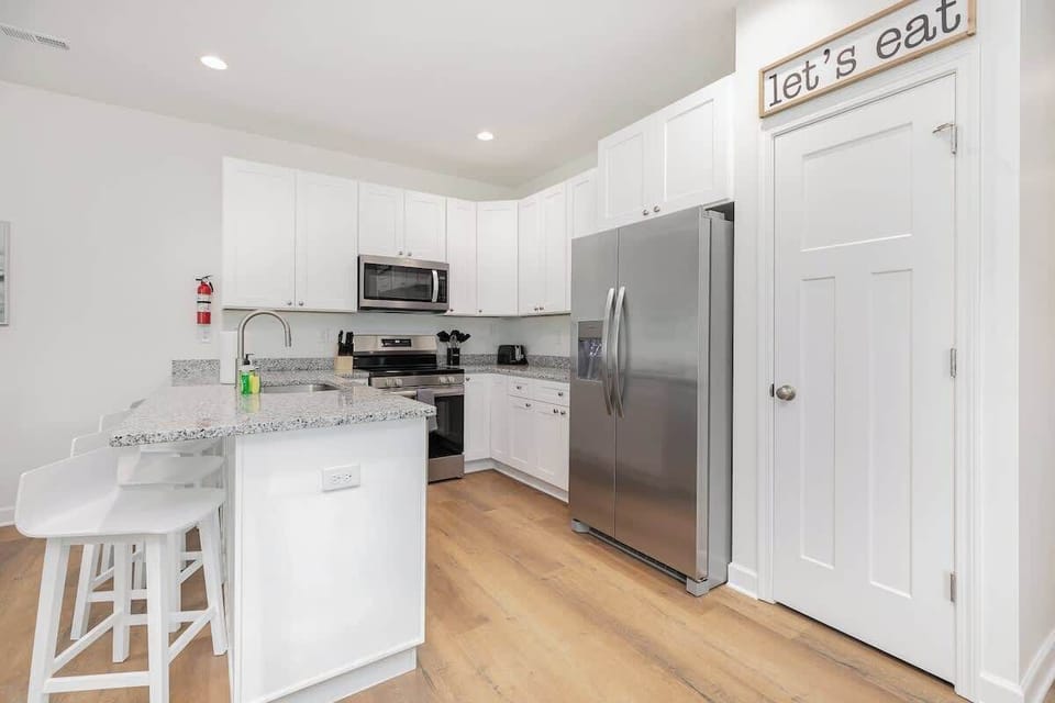 Enjoy cooking a meal from one of our fully stocked kitchens and being able to socialize with friends and family in the open concept living areas.