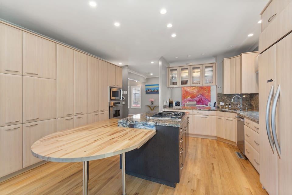 Prepare meals with ease—everything you need in a sleek, modern space.