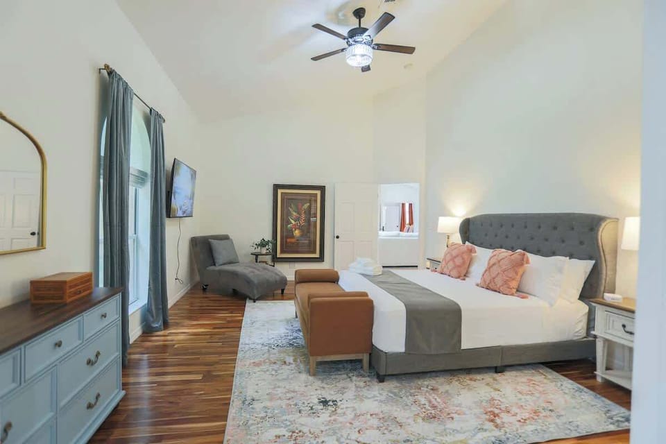 Enjoy peaceful nights in this beautifully appointed master suite with high ceilings, elegant finishes, and a spa-inspired en-suite bathroom. It’s where comfort and luxury come together effortlessly.