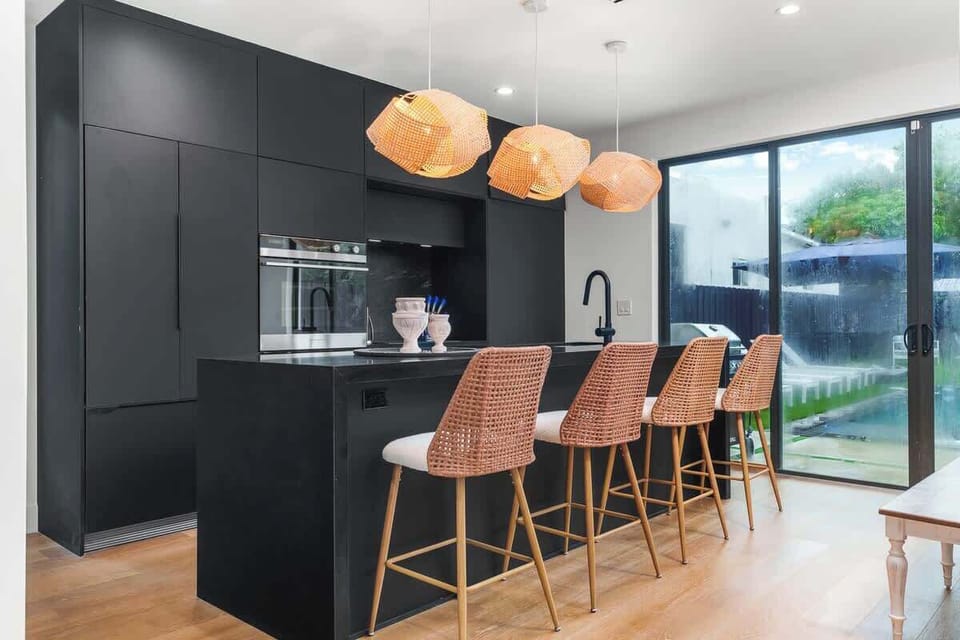 Savor every meal in style! This modern kitchen and elegant dining space are perfect for cooking up a feast and gathering with your group. 