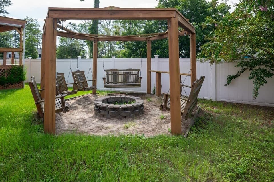 Fire Pit and Swing in back yard