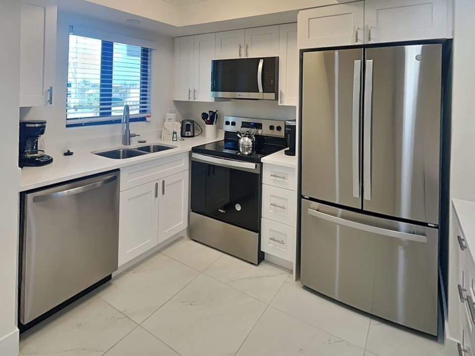 Fully Equipped Kitchen with Stainless Steel Appliances