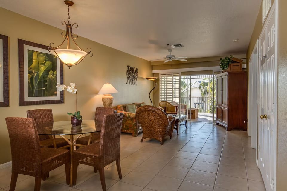 Unwind together in the airy living space with balcony access.
