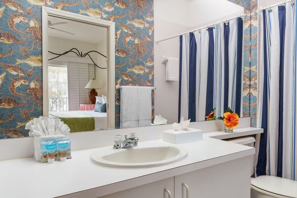 Refresh in the clean bath with plush towels provided.