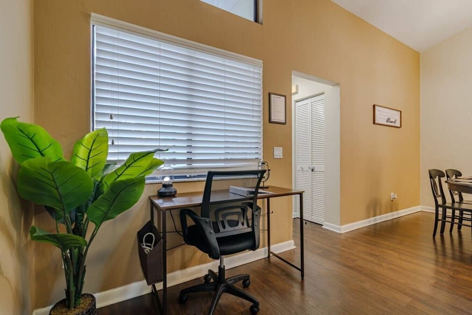 Office desk area with office chair.