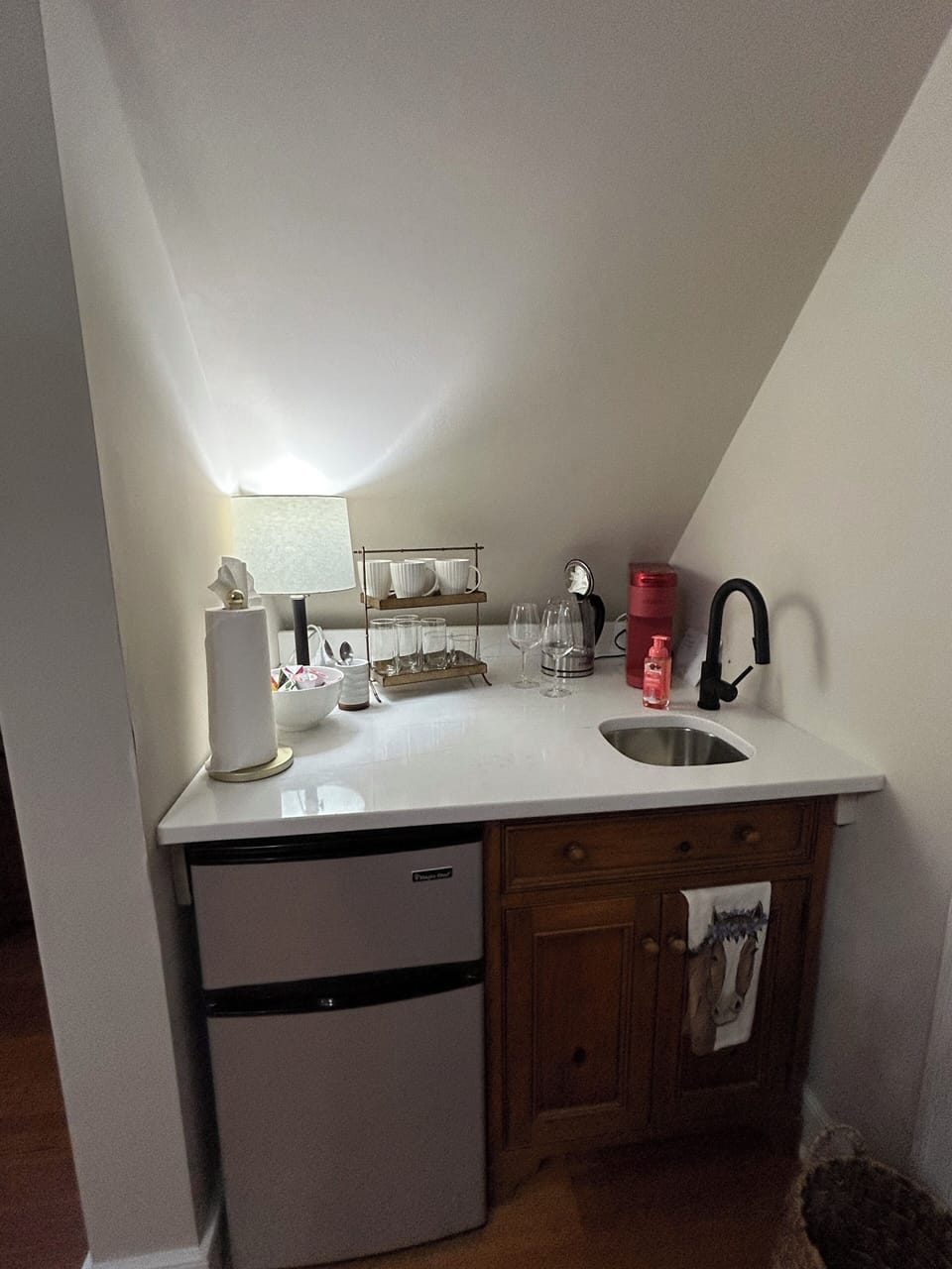 Kitchenette with water in fridge 