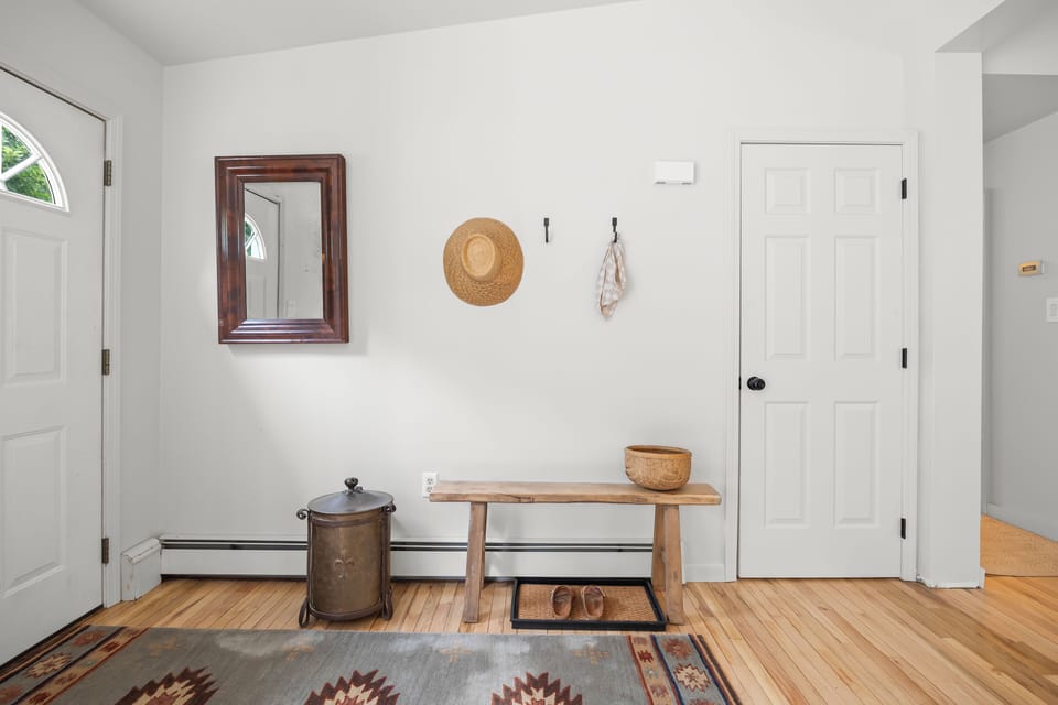 Inviting entryway perfect for your market basket or jacket after adventures 