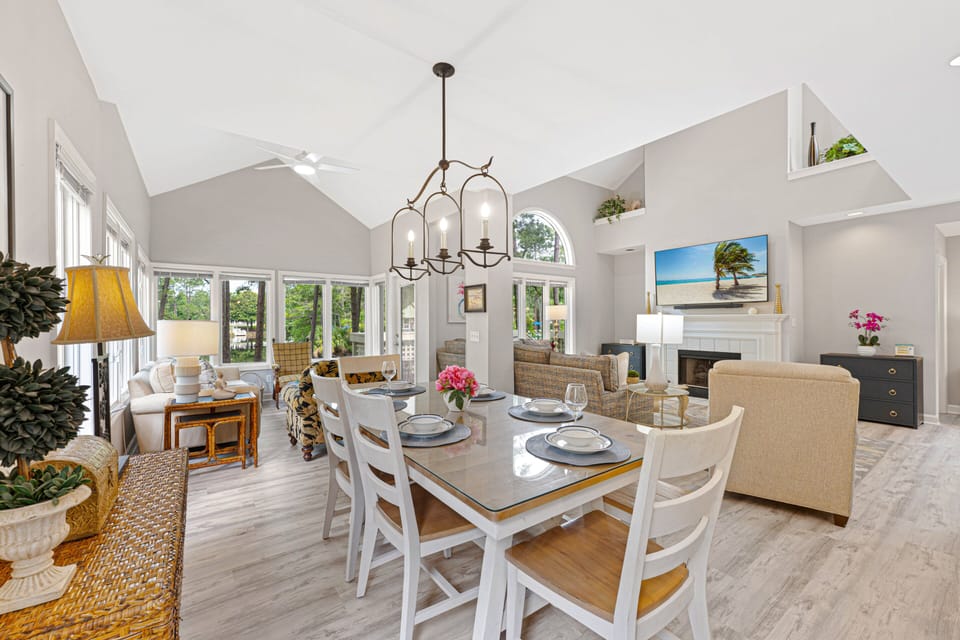 Soft natural light, updated lighting fixtures, and an open layout create a comfortable space ideal for everyday living and easy entertaining.