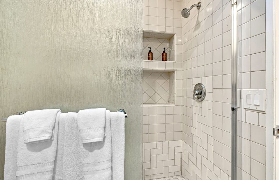 Blending comfort and convenience, the primary suite features a en-suite bathroom for the ultimate retreat
                