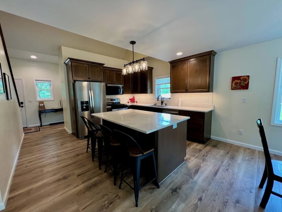 Kitchen island includes seating for 4 