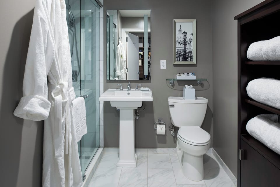 Start your morning in a spotless bathroom with fresh towels.
