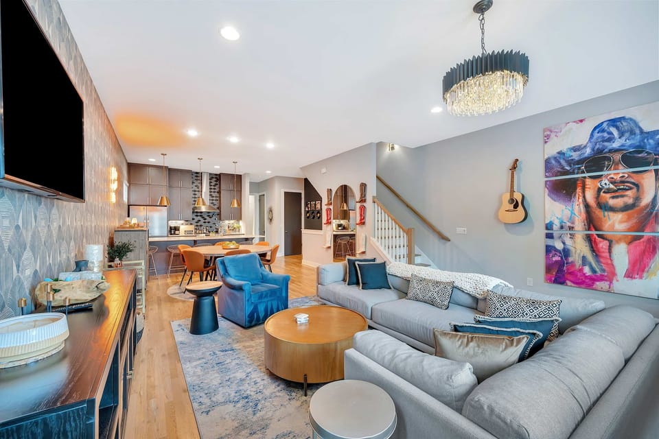 Explore this chic Nashville retreat, perfect for bachelorette parties or family reunions. Enjoy spacious living areas, a sleek kitchen, and plush furnishings while making memories in downtown Nashville!