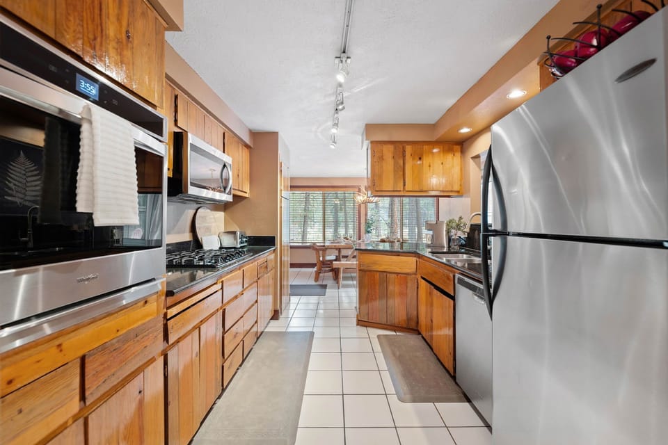 Everything you need, right where you need it—this kitchen is fully equipped and beautifully upgraded