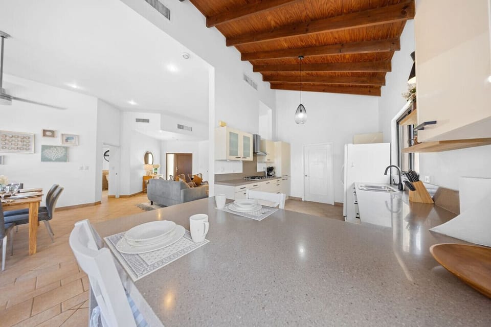 Start your morning right at this cozy breakfast bar, with views of the kitchen, dining, and living space all in one. It`s the perfect spot for coffee, conversation, or a quick bite before heading out.
