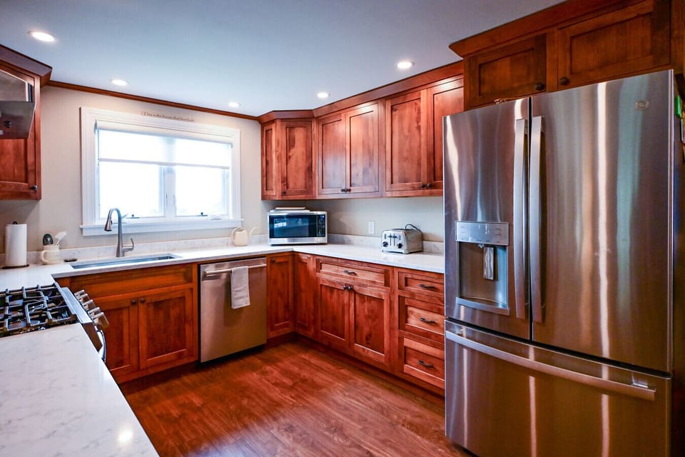 Enter the home through the kitchen with updated appliances