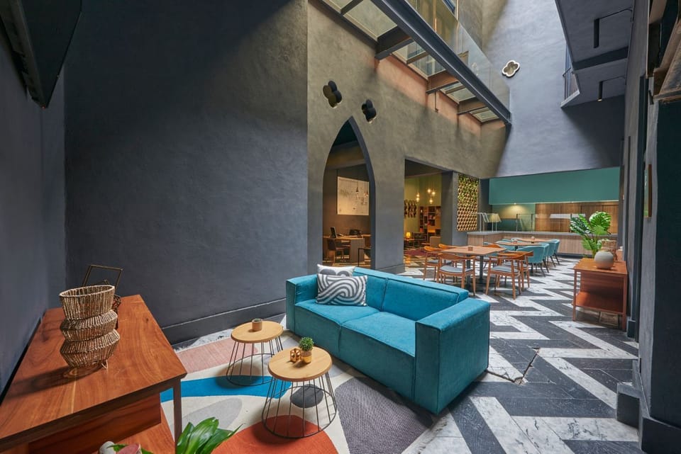 Settle into plush seating with airy courtyard views.