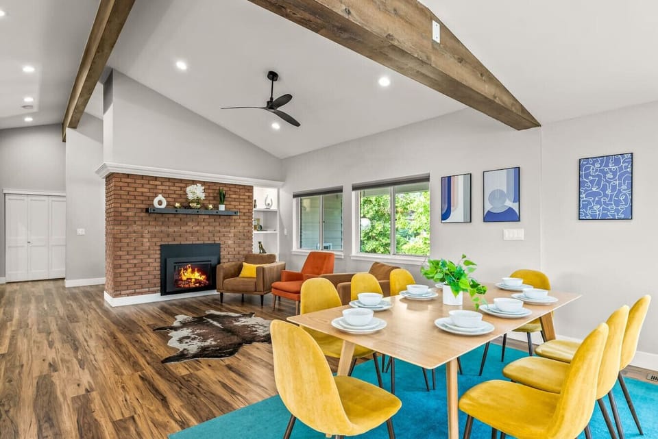 Spacious open floor plan with vaulted ceilings and panoramic mountain views