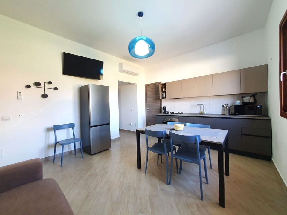Furniture, Interior Design, Flooring, Floor, Wood, Room, Ceiling, Lighting, Chair, Table