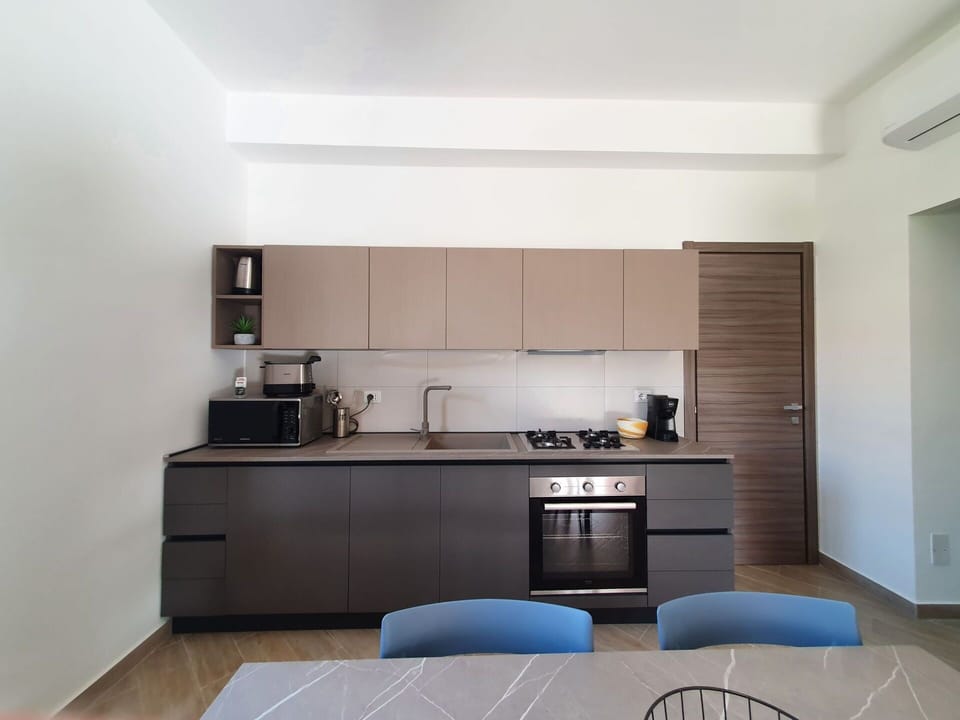 Kitchen, Interior Design, Furniture, Kitchen Appliance, Countertop, Major Appliance, Wood, Cabinetry, Flooring, Room