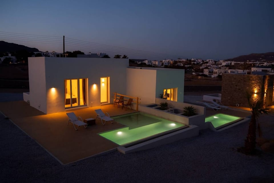 Evening Ambiance Around the Pool – The outdoor area illuminated beautifully for peaceful night swims.
