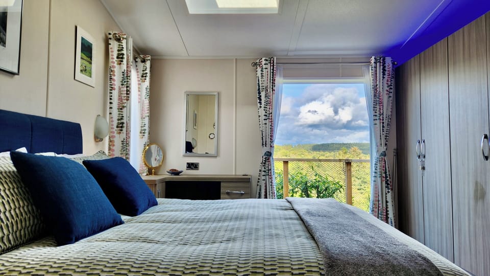 Master bedroom - full en-suite, French doors onto deck