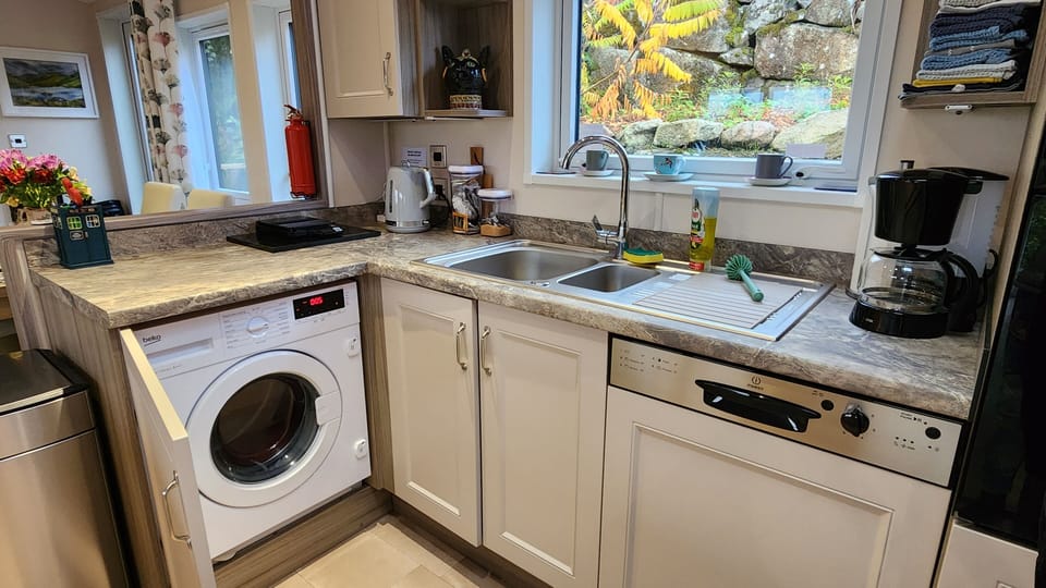 Fully equipped kitch- dishwasher, washing machine, full-size fridge-freezer etc.