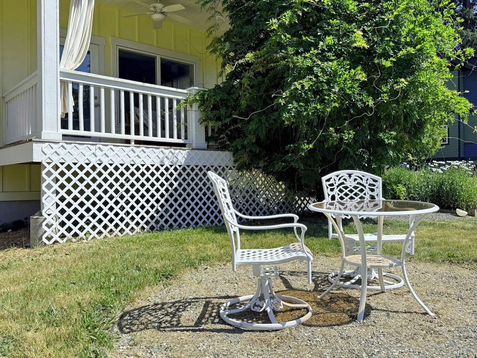 Exterior Table and Chairs Below Back Porch