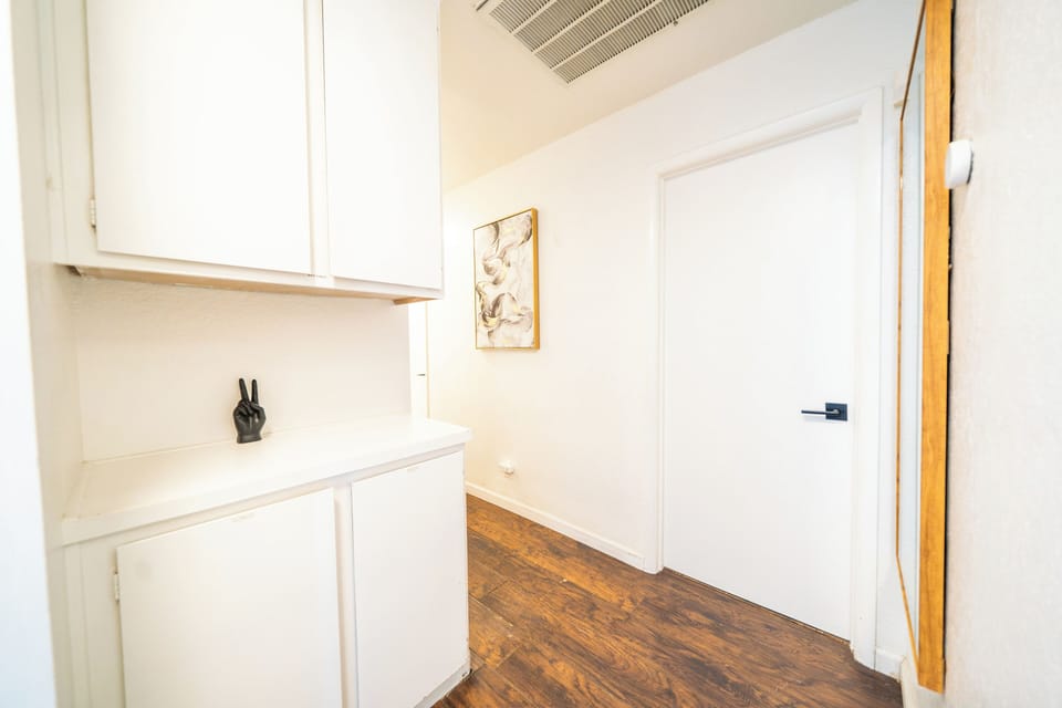 Clean hallway with modern design and storage space