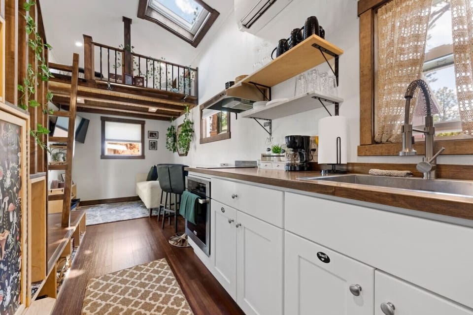 Cook in style with modern appliances and rustic touches, perfect for your getaway!