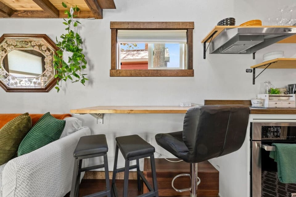 Sleek counters, stylish seating, and bright window views invite culinary adventures!