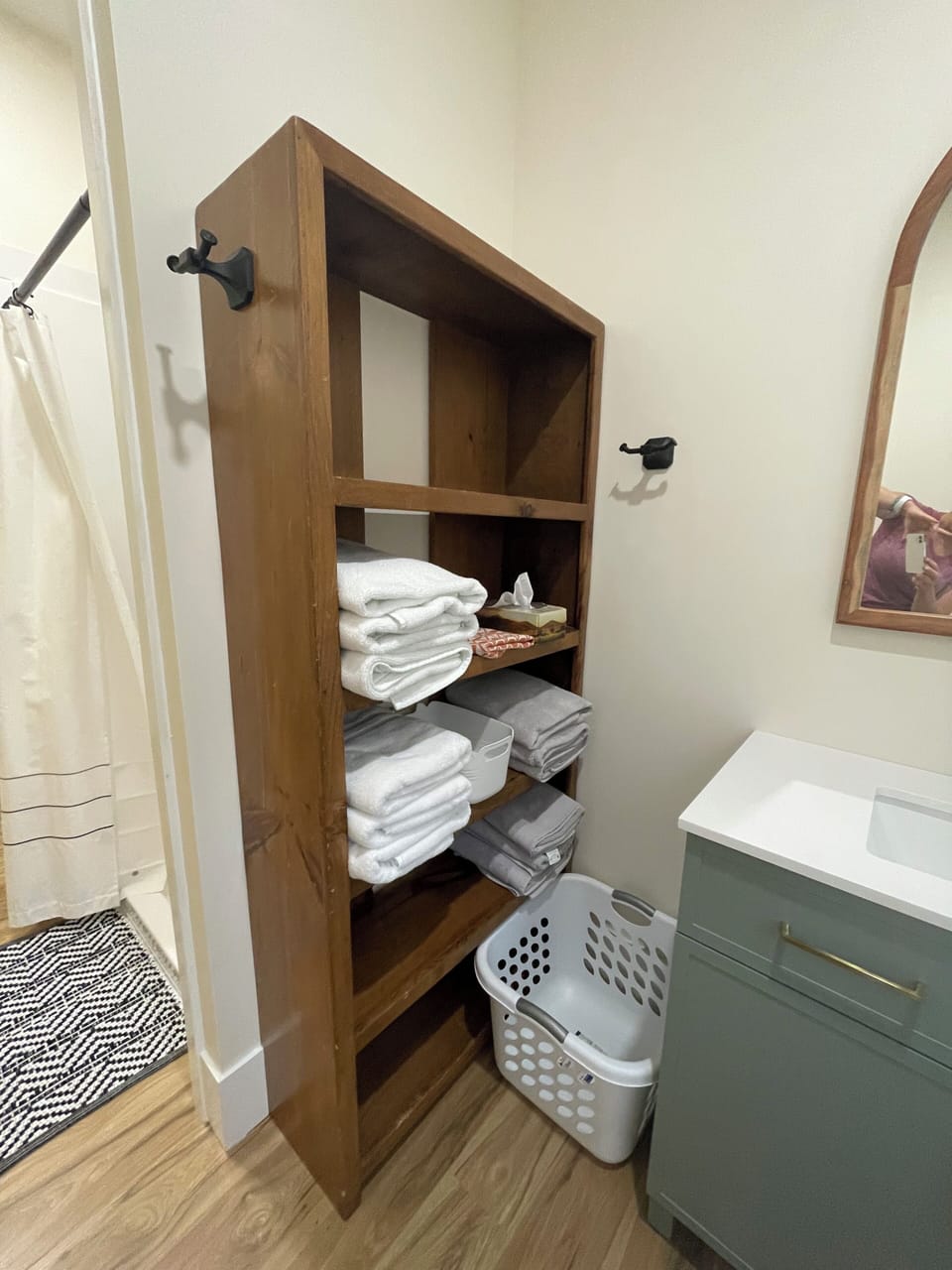 Bathroom.  Shower, toilet, sink. Towels provided.