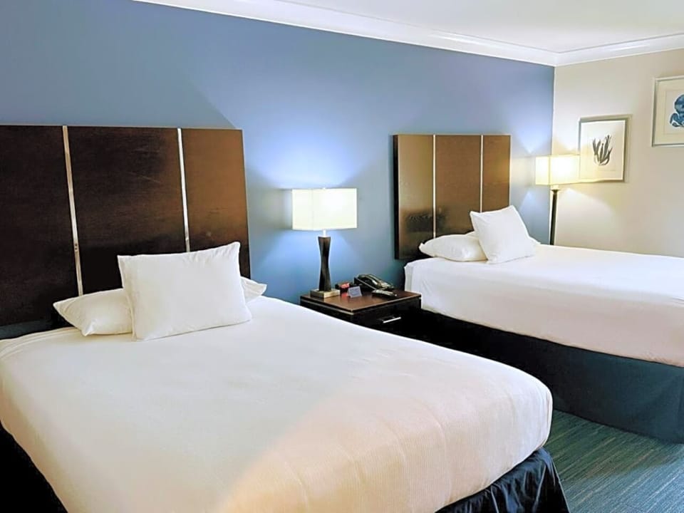 Sink into plush pillows and enjoy a restful night’s sleep.