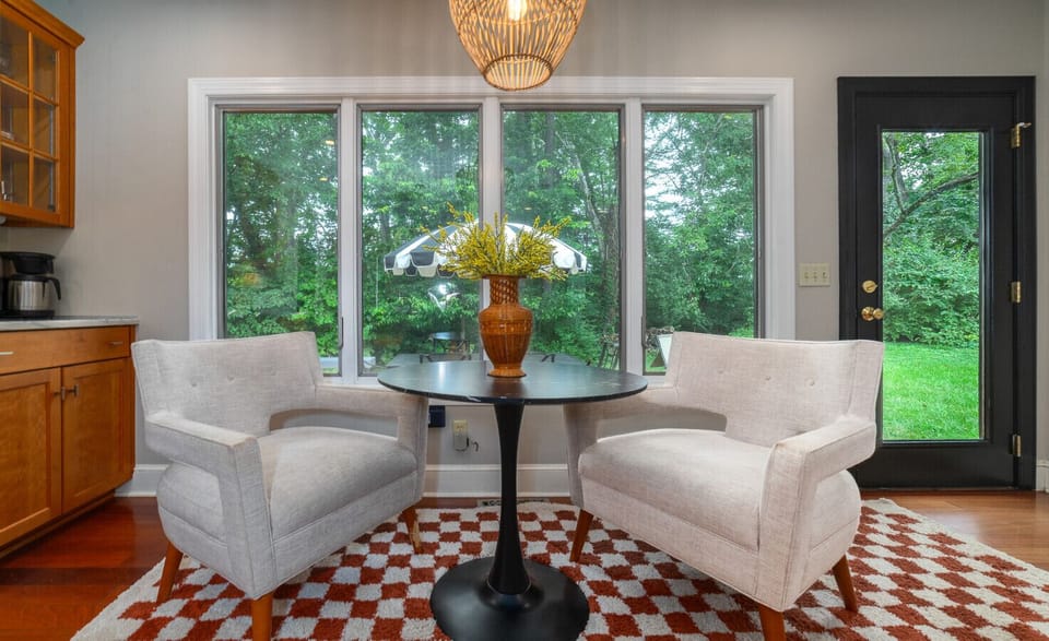 Start your day with coffee at the cozy breakfast table in the kitchen overlooking the backyard deck.