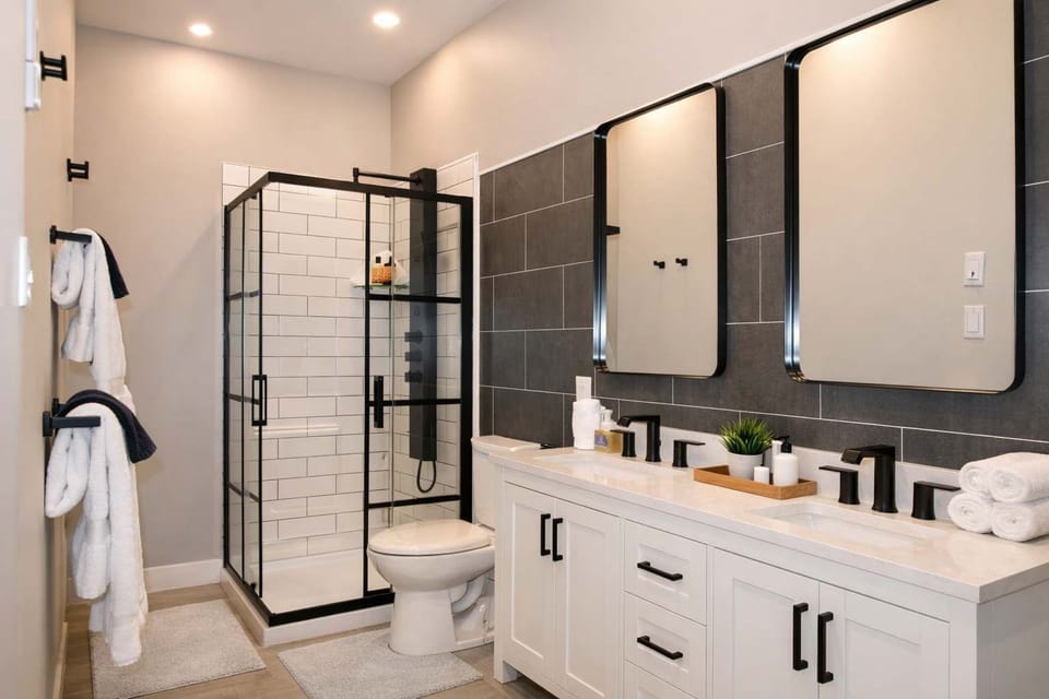 The bathroom is equipped with a double vanity, no fighting over who gets the sink!