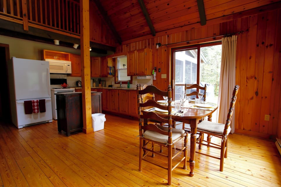 eating area. Patio door to deck and sunroom