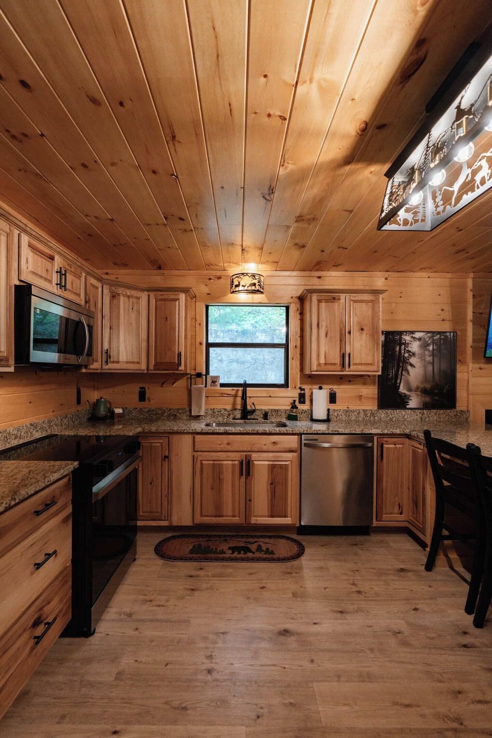 Kitchen offers septic safe garbage disposal for home coming while staying in the mountains!
