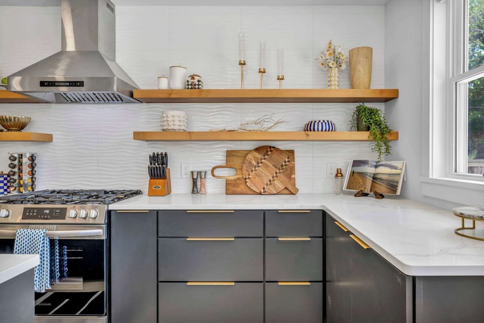 This beautifully designed kitchen features sleek finishes, wooden accents, and high-end appliances, creating a relaxing and functional space. Every detail is carefully curate an unforgettable experience, blending style with convenience for your stay.