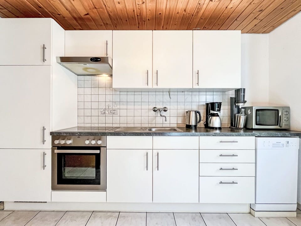 Kitchen, Kitchen Appliance, Countertop, Flooring, Major Appliance, Wood, Interior Design, Cabinetry, Floor, Sink