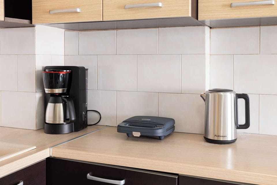 Appliances Close-Up: Coffee Maker, Kettle, Toaster, and Cooking Essentials

