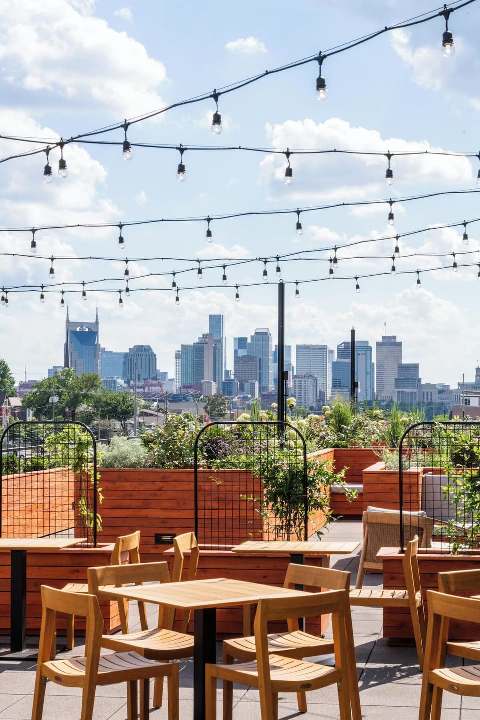 Soak up skyline views under café lights on the rooftop.